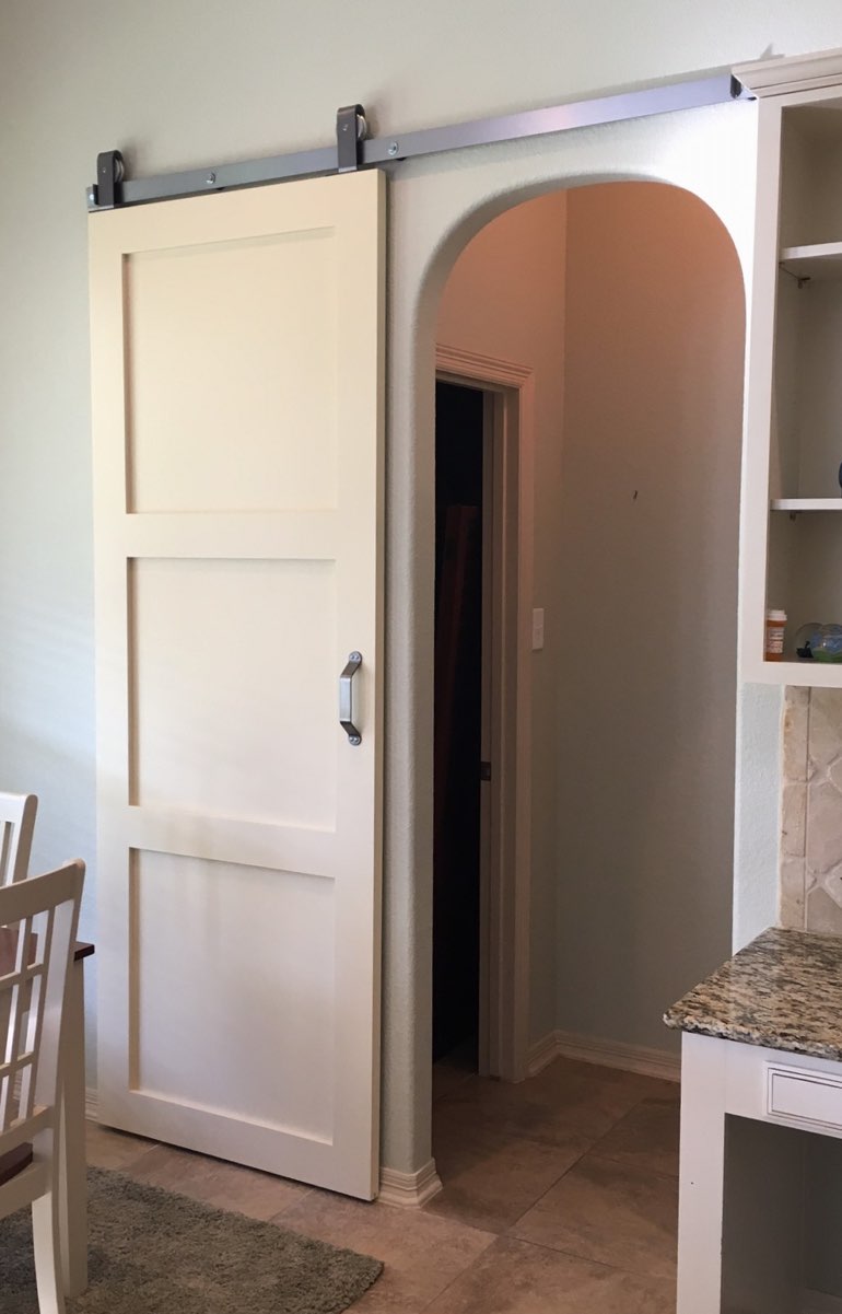 Shaker style barn door in Dover kitchen.